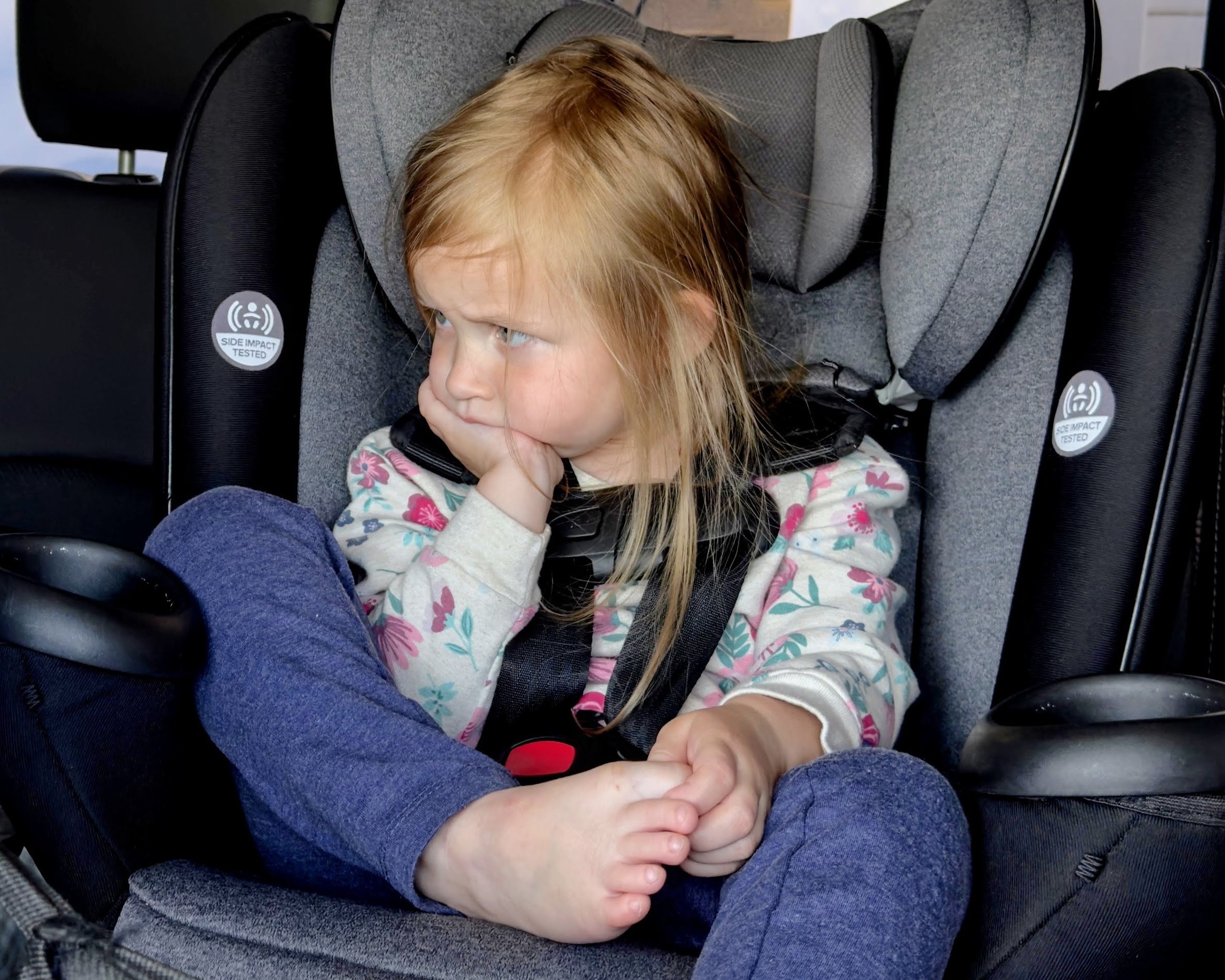 threenager stage, toddler girl mid-pout during the threenager stage